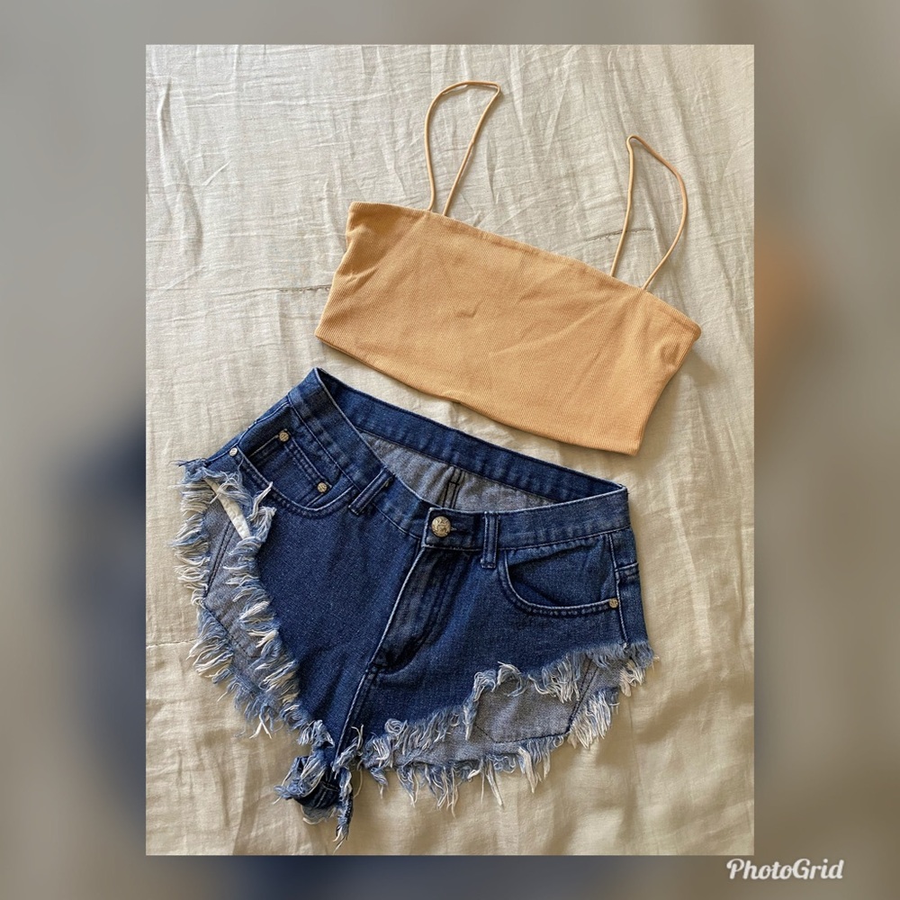 Distressed cheeky shorts